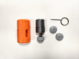 An Orange FTEC-LAD Impact Sound Grenade disassembled on a white background