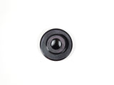 A circular black plastic component with a hollow center, photographed from above on a plain white background.