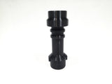 A black cylindrical plastic component with a flanged base, photographed against a plain white background.